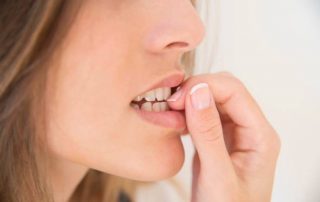 effects of nail biting on oral health