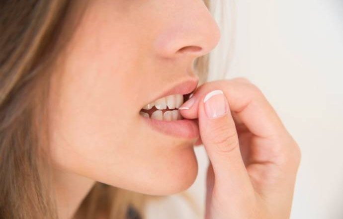 effects of nail biting on oral health